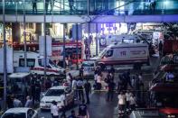 Emergency services at Istanbul's Ataturk airport following an attack that left at least 36 people dead