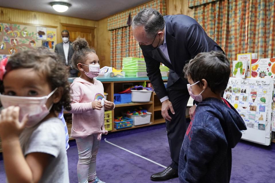 Douglas Emhoff, top right, husband of Vice President Kamala Harris, speaks to pre-school children after reading The Very Hungry Caterpillar, by Eric Carle, at Mother Hubbard Pre-School Center, in Milford, Mass. Emhoff visited the child care center to draw attention to the Biden administration's Build Back Better agenda Emhoff Massachusetts, Milford, United States - 20 Sep 2021