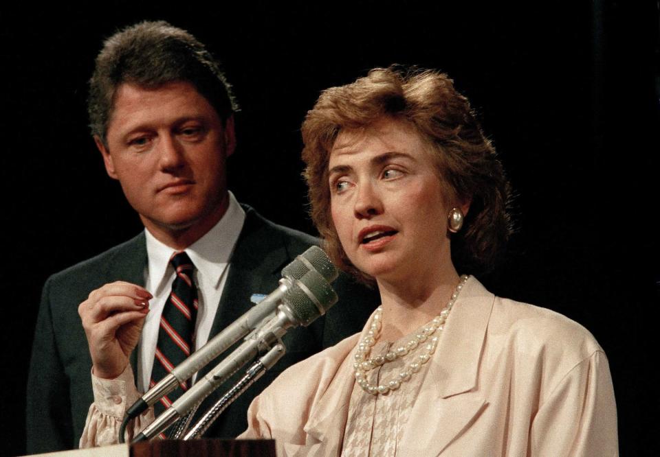 First lady of Arkansas Hillary Rodham Clinton speaks at a conference in 1987&#xa0;in Little Rock, Ark., as then-Gov. Bill Clinton looks on.&#xa0;(Photo: AP)