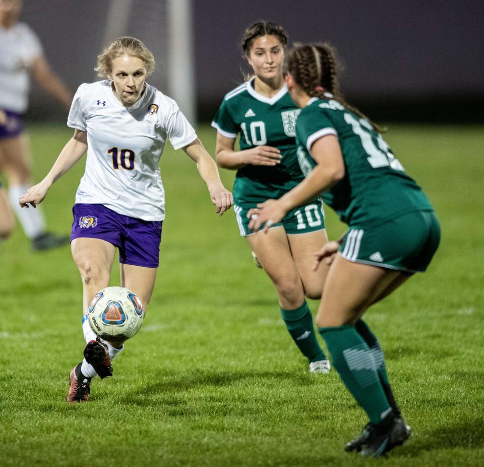 Hononegah's Molly Hughes takes control of the ball against Boylan on Thursday, April 21, 2022, at Boylan High School in Rockford.