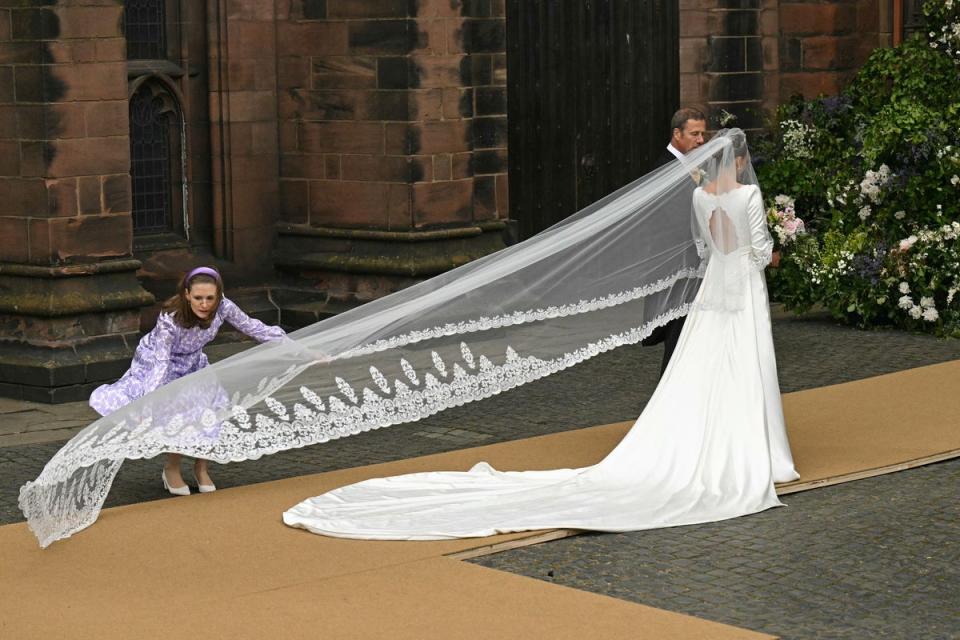 Olivia Henson arrives at Chester Cathedral (AFP via Getty Images)