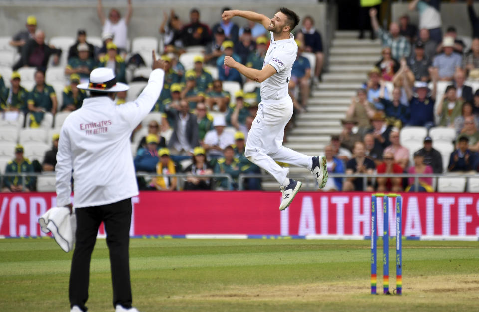 England's Mark Wood celebrates after dismissing Australia's Pat Cummins during the third day of the third Ashes Test match between England and Australia at Headingley, Leeds, England, Saturday, July 8, 2023. (AP Photo/Rui Vieira)