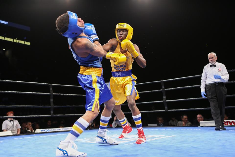 Richardson Hitchins (right) fights Christian Coakley in the N.Y. Golden Gloves tournament. (AP)