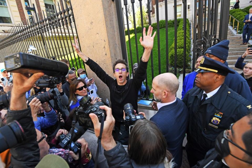 Prof. Shai Davdai (center), an outspoken Israel supporter, is joined by fellow supporters outside Columbia University. Matthew McDermott