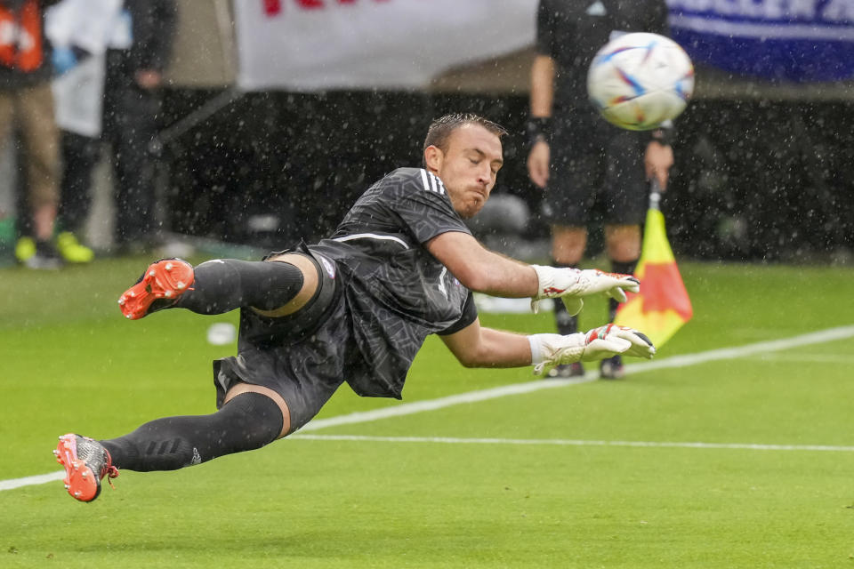 Chile's goalkeeper Sebastián Perez a saves a penalty during the match between Ghana and Chile at the Kirin Cup soccer tournament in Suita, west Japan, Tuesday, June 14, 2022. (AP Photo/Eugene Hoshiko)