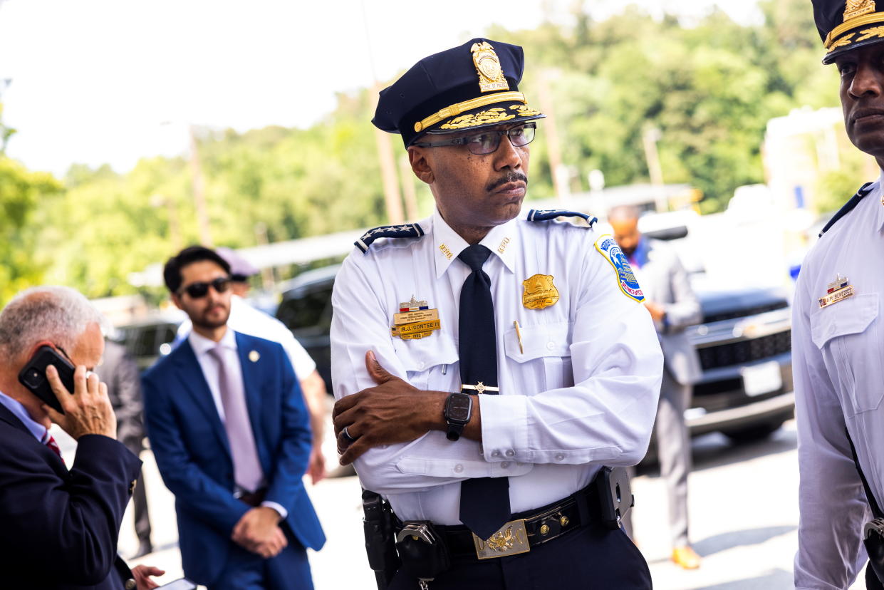 DC Police Chief Robert Contee looks on as U.S. Deputy Attorney General Lisa Monaco (not pictured) tours an ATF crime gun intelligence mobile command center (MCC), which provides investigators with ballistic processing at crime scenes, after the announcement of the launch of the Justice Department's five cross-jurisdictional gun trafficking strike forces at the ATF in Washington, DC, U.S., July 22, 2021.  Jim Lo Scalzo/Pool via REUTERS