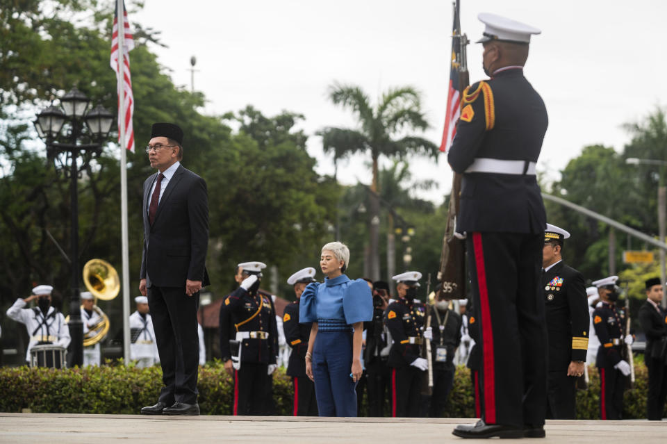 Malaysian Prime Minister Anwar Ibrahim, left, attends a wreath-laying ceremony at Rizal Park in Manila, Philippines Thursday, March 2, 2023. (Lisa Marie David/Pool Photo via AP)