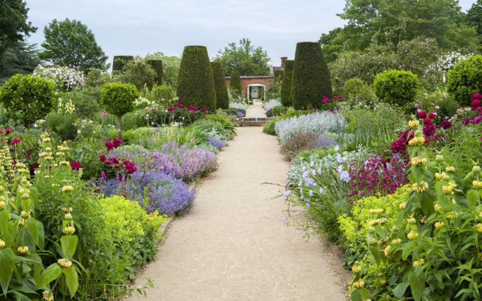 The double herbaceous borders at Mottisfont Abbey, Hampshire (National Trust), are full of plants that provide interest for months - Marianne Majerus