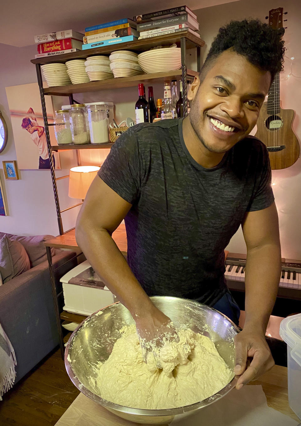 Broadway performer Max Kumangai makes sourdough bread from his apartment in New York. The triple threat from the musical “Jagged Little Pill” has leaned into a fourth skill as the pandemic marches on: baking and selling his own sourdough. (Michael Lowney/Humpday Dough via AP)