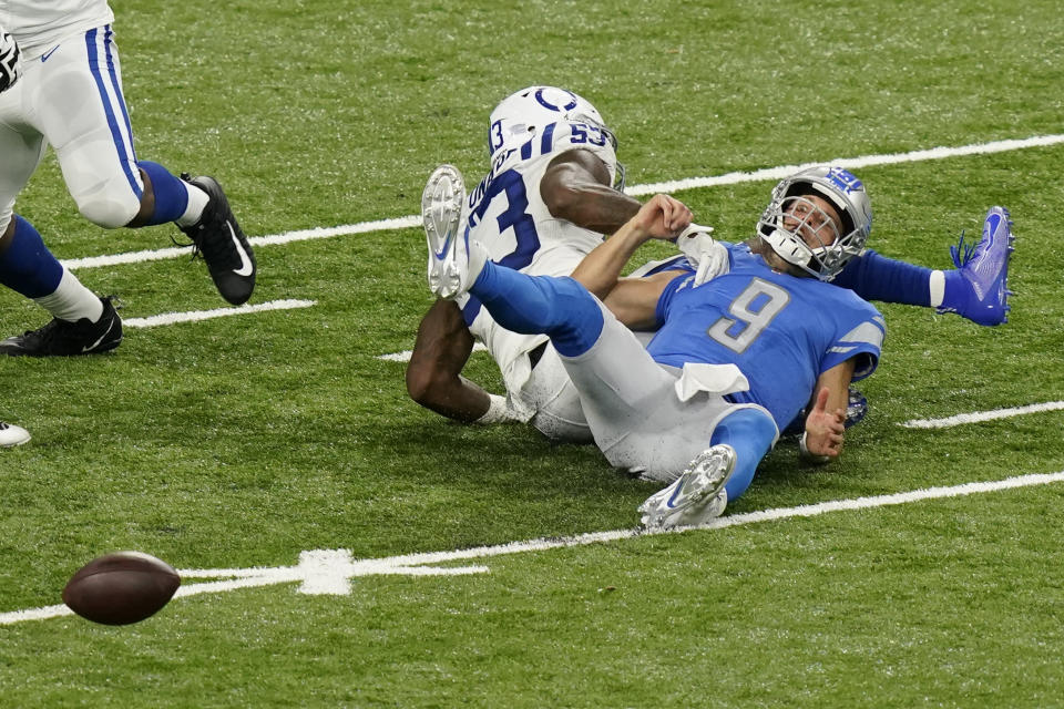 Detroit Lions quarterback Matthew Stafford (9) fumbles the ball after being tackled by Indianapolis Colts outside linebacker Darius Leonard (53) during the second half of an NFL football game, Sunday, Nov. 1, 2020, in Detroit. (AP Photo/Carlos Osorio)