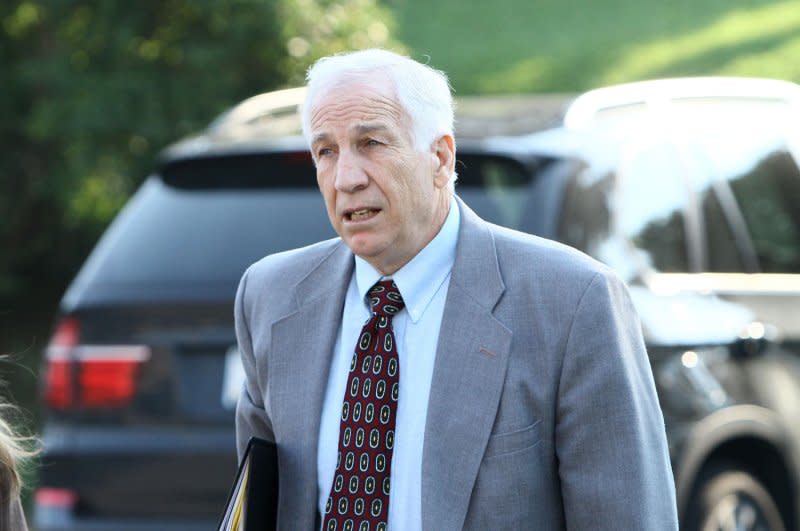 Jerry Sandusky arrives for closing arguments in his child sex abuse case at Centre County courthouse in Bellefonte, Pa., on June 21, 2012. On July 23, 2012, the NCAA imposed severe penalties, including a $60 million fine, on Penn State University for the scandal. File Photo by George M Powers/UPI