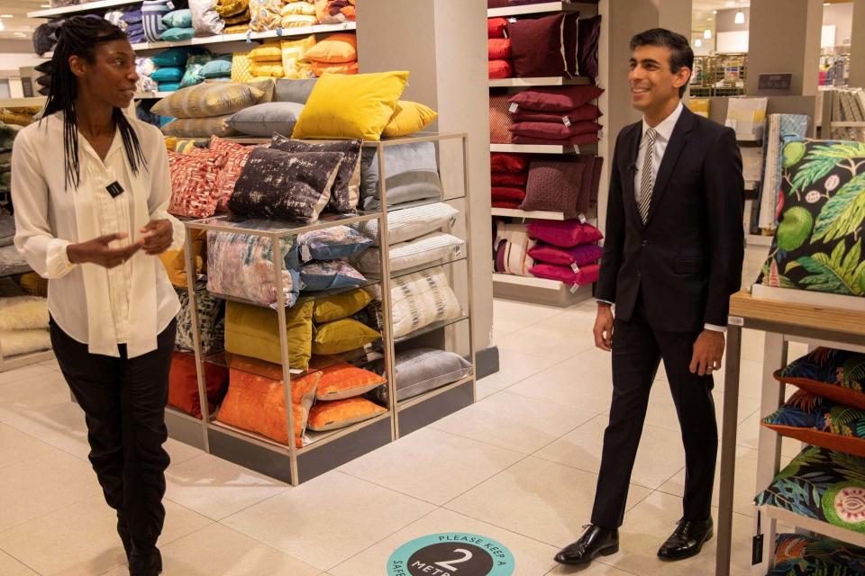 Chancellor Rishi Sunak with John Lewis chairman Sharon White during a visit to a store in London last month (HM TREASURY/AFP via Getty Images)