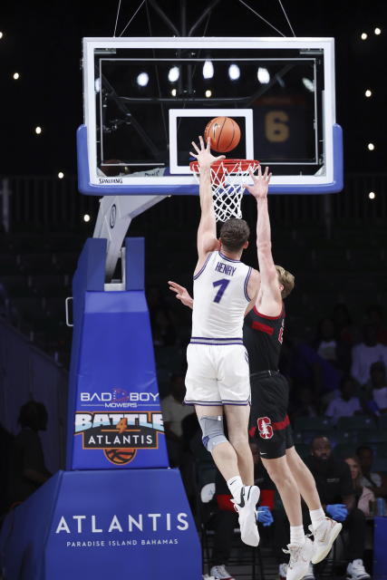 In a photo provided by Bahamas Visual Services, Northern Iowa's Cole Henry (1) shoots over Stanford's James Keefe, right, during an NCAA college basketball game in the Battle 4 Atlantis at Paradise Island, Bahamas, Friday, Nov. 24, 2023. (Ronnie Archer/Bahamas Visual Services via AP)