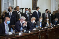 Israeli Foreign Minister Yair Lapid, third left, meets with Egyptian Foreign Minister Sameh Shoukry at Tahrir Palace in Cairo, Egypt, Thursday, Dec. 9, 2021. (AP Photo/Nariman El-Mofty)