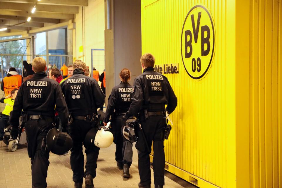 <p>Police under the main tribune at the UEFA Champions League Quarter Final first leg match between Borussia Dortmund and AS Monaco at Signal Iduna Park on April 11, 2017 in Dortmund, Germany. (Photo by Matthew Ashton – AMA/Getty Images) </p>