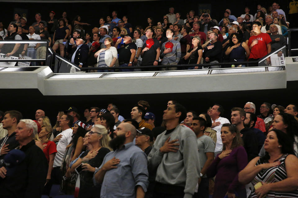 <p>Supporters of Republican presidential candidate Donald Trump stand to recite the Pledge of Allegiance before a rally in Anaheim, Calif., May 25, 2016. (Reuters/Jonathan Ernst) </p>