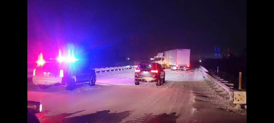 First responders arrive to the scene of a jackknifed semi truck Feb. 22, 2023 on Interstate 43 north of Manitowoc County JJ near Manitowoc, Wis.