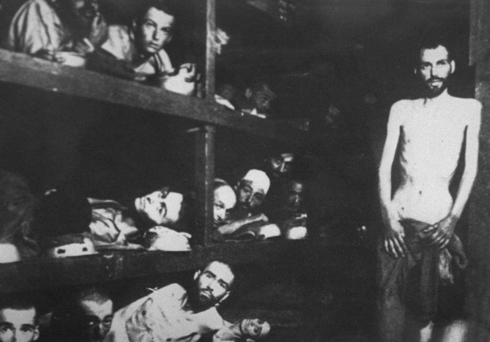 <div class="inline-image__caption"><p>Jewish deportees in the Buchenwald concentration camp pose for a Soviet photographer in January 1945. Middle bunk bed, the 6th from left, lies Elie Wiesel, one of the rare camp survivors and 1986 Nobel Peace Prize winner.</p></div> <div class="inline-image__credit">AFP via Getty</div>