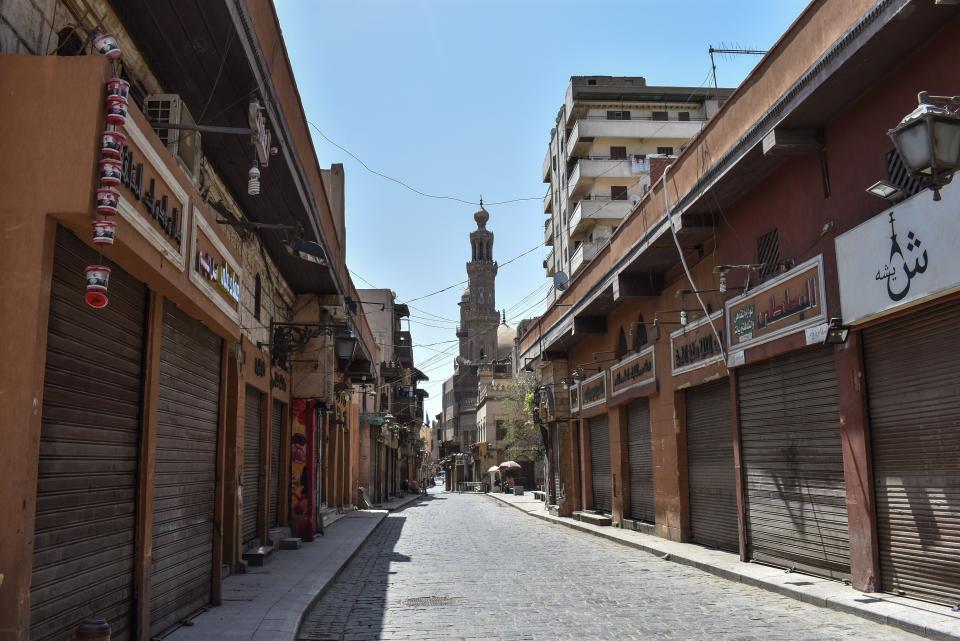 Stores were closed on Cairo’s Al-Moez Street, where the Egyptian government imposed a two-week curfew, during which all public transportation in the city was suspended.