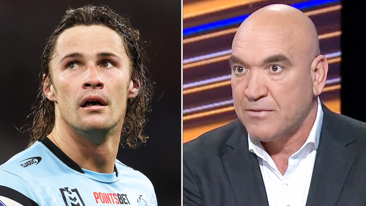 Nicho Hynes reacts and Gorden Tallis speaks.