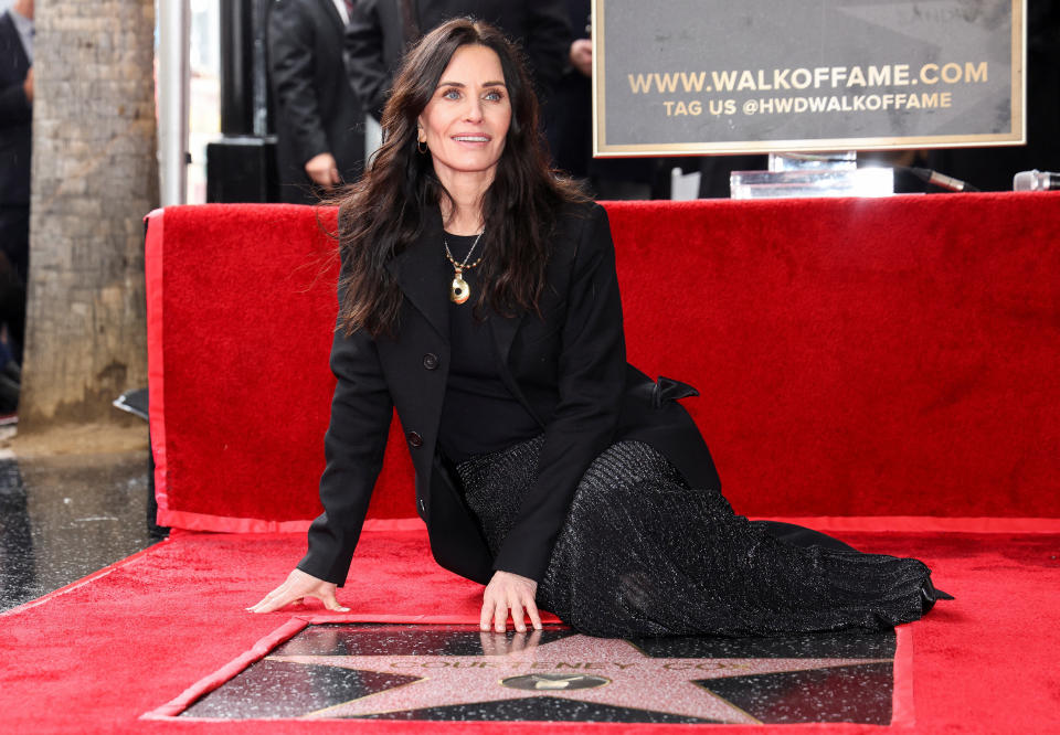 <p>Actor Courteney Cox poses during her star unveiling ceremony on the Hollywood Walk of Fame in Los Angeles, California, U.S., February 27, 2023. REUTERS/Mario Anzuoni</p> 
