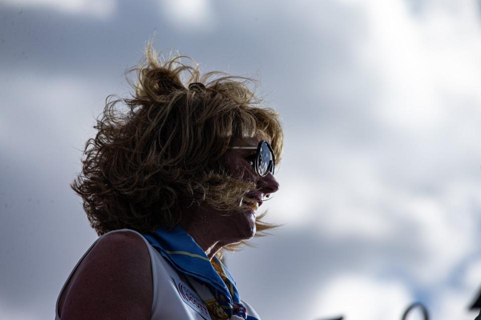 Nueces County Judge candidate and former state representative Connie Scott ascends the media riser to do an interview at former president Donald Trump's rally in Robstown, Texas, on Saturday, Oct. 22, 2022.