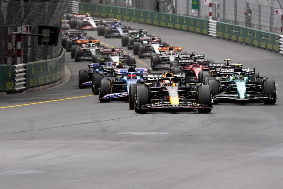 Red Bull driver Max Verstappen of the Netherlands, front, steers his car at the start of the Monaco Formula One Grand Prix, at the Monaco racetrack, in Monaco, Sunday, May 28, 2023. (AP Photo/Luca Bruno)