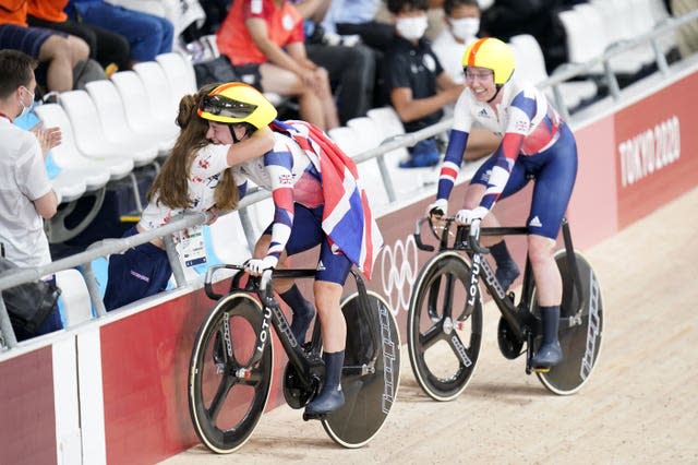 Great Britain’s Laura Kenny, left, and Katie Archibald celebrate their historic triumph