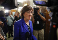 Sen. Susan Collins, R-Maine, walks past members of the media as she arrives at her office on Capitol Hill in Washington, Monday, Sept. 17, 2018. (AP Photo/Pablo Martinez Monsivais)