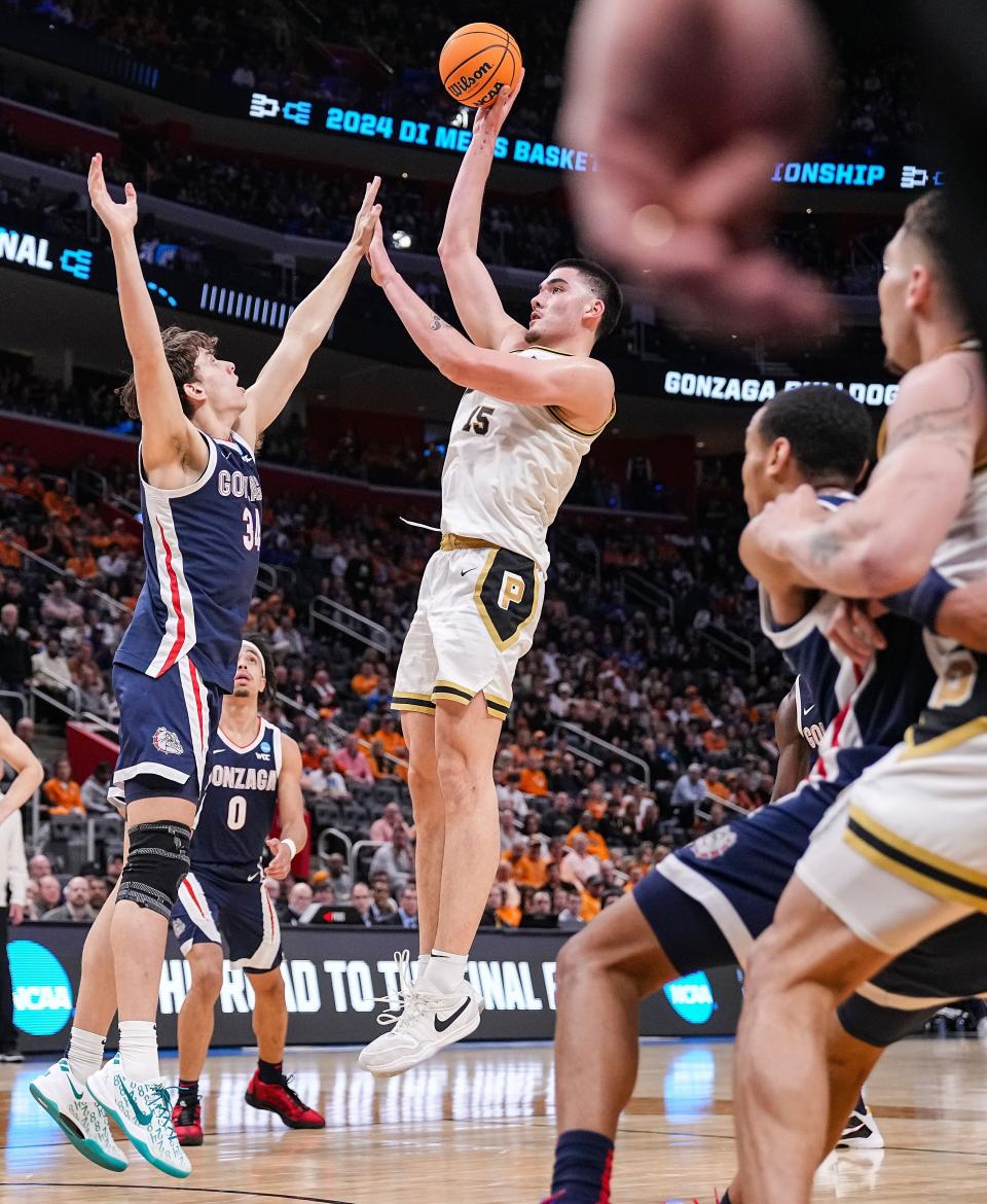 Purdue Boilermakers center Zach Edey (15) shoots the ball against Gonzaga Bulldogs forward Braden Huff (34) on Friday, March 29, 2024, during the midwest regional semifinals at the Little Caesars Arena in Detroit. The Purdue Boilermakers defeated the Gonzaga Bulldogs, 80-68.