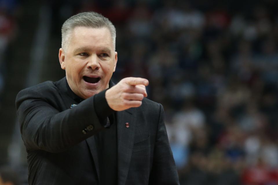 Mar 18, 2022; Pittsburgh, PA, USA; Ohio State Buckeyes head coach Chris Holtmann reacts to a play in the first half against the Loyola (Il) Ramblers during the first round of the 2022 NCAA Tournament at PPG Paints Arena. Mandatory Credit: Charles LeClaire-USA TODAY Sports