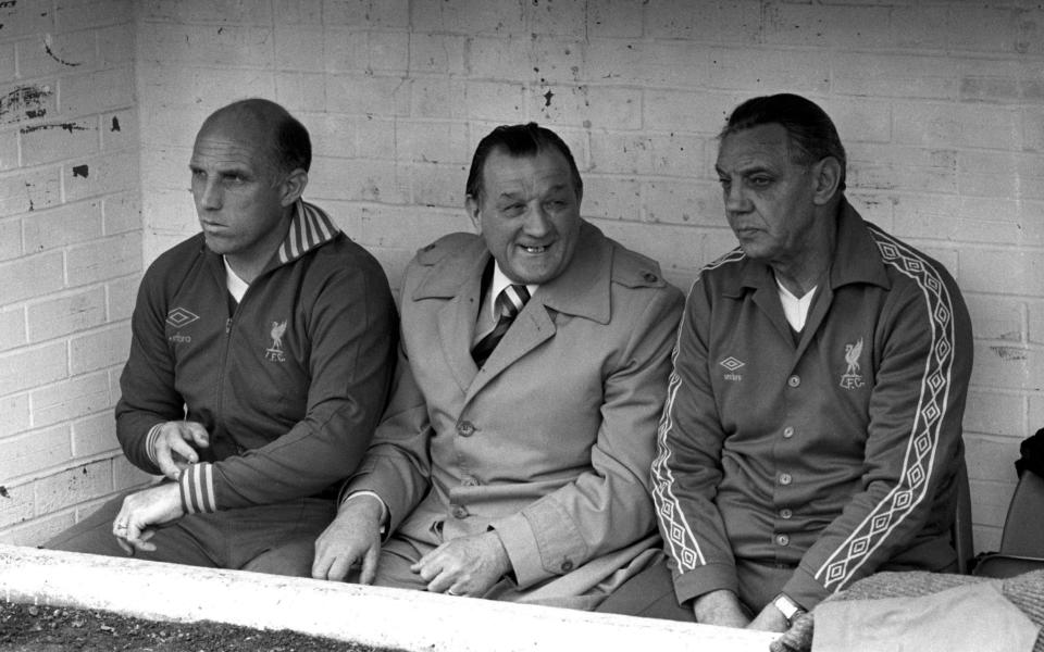 Paisley, flanked by trainer Ronnie Moran (left) and assistant manager Joe Fagan - PA