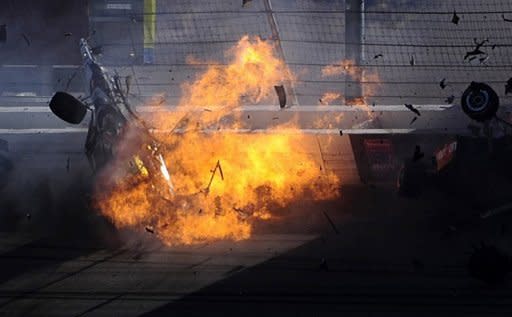 The car of Dan Wheldon bursts into flames in a 15 car pile up during the Las Vegas Indy 300. Wheldon was killed in a massive crash at the Las Vegas 300 IndyCar series finale on Sunday