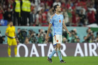 Spain's Sergio Busquets reacts after missing a penalty in a shootout during the World Cup round of 16 soccer match between Morocco and Spain, at the Education City Stadium in Al Rayyan, Qatar, Tuesday, Dec. 6, 2022. (AP Photo/Ebrahim Noroozi)