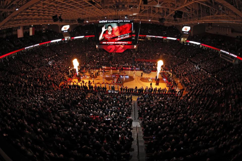 Flames shoot in the air as the Texas Tech starting lineup is announced before an NCAA college basketball game against Kentucky, Saturday, Jan. 25, 2020, in Lubbock, Texas. (AP Photo/Brad Tollefson)