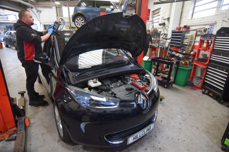 Tom runs diagnostics on a fully electric Renault Zoe, in High Wycombe