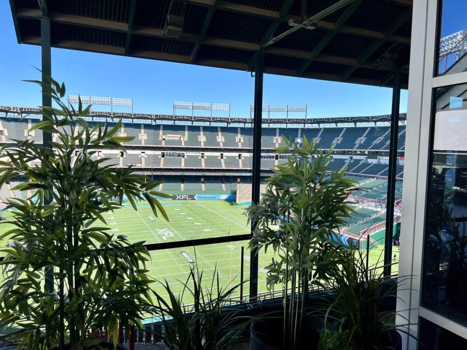 The Choctaw Stadium field is visible from a cigar bar smoking deck at Hearsay in Arlington, March 5, 2023.