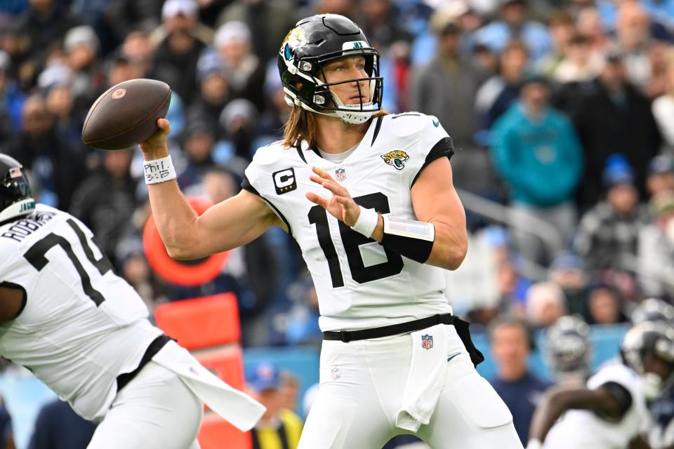 Jacksonville Jaguars quarterback Trevor Lawrence (16) looks to pass against the Tennessee Titans during the first half of an NFL football game Sunday, Jan. 7, 2024, in Nashville, Tenn. (AP Photo/John Amis)