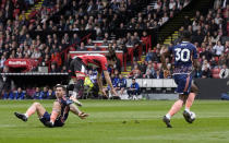 Nottingham Forest's Gonzalo Montiel, left, fouls Sheffield United's Ben Brereton Diaz in the penalty area, which resulted in a penalty to Sheffield United, during the English Premier League soccer match between Sheffield United and Nottingham Forest, at Bramall Lane, in Sheffield, England, Saturday, May 4, 2024. (Danny Lawson/PA via AP)