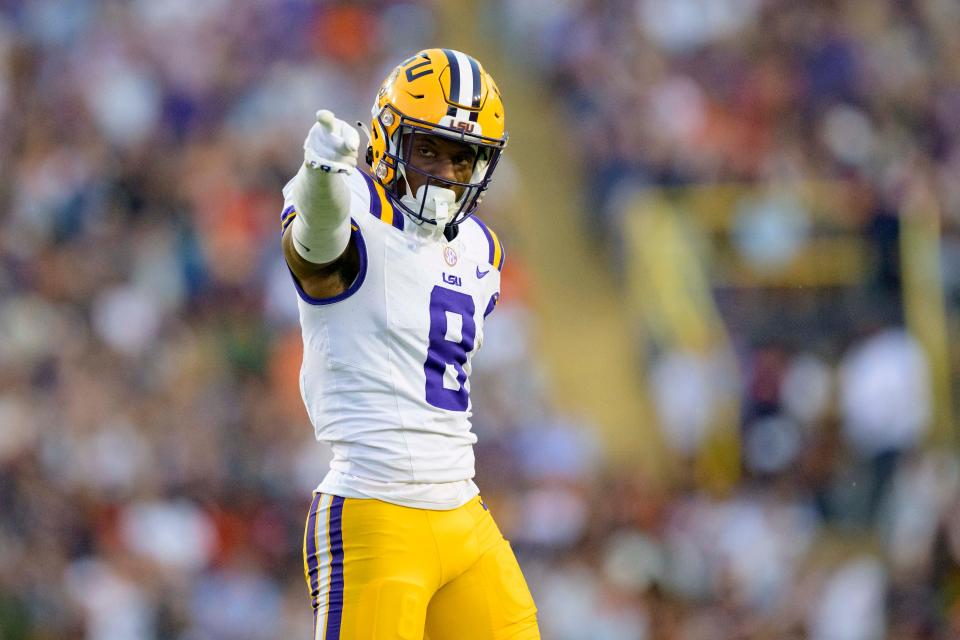Oct 14, 2023; Baton Rouge, Louisiana, USA; LSU Tigers wide receiver Malik Nabers (8) celebrates a run after a reception against the Auburn Tigers during the first quarter at Tiger Stadium. Mandatory Credit: Matthew Hinton-USA TODAY Sports