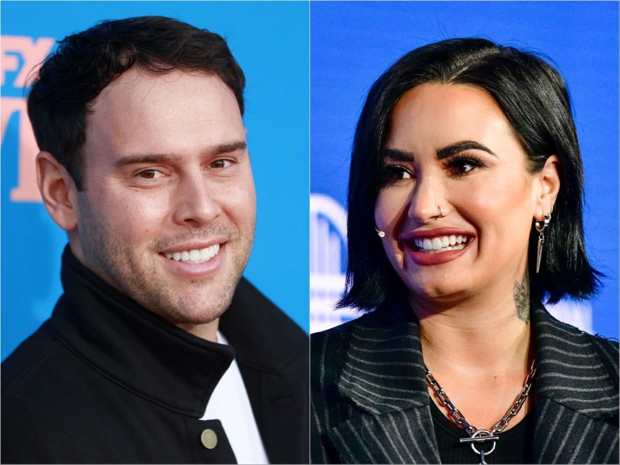 Scooter Braun (left) and Demi Lovato (Getty Images)
