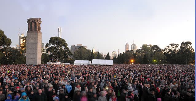 Crowds gather at the Shrine of Remembrance for the ANZAC Day dawn service in Melbourne. Credit: AAP