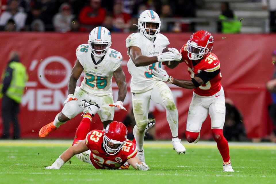 Dolphins running back Raheem Mostert, breaking a long run against the Chiefs during Miami's final drive on Sunday, will be getting some help in the backfield with De'Von Achane returning.