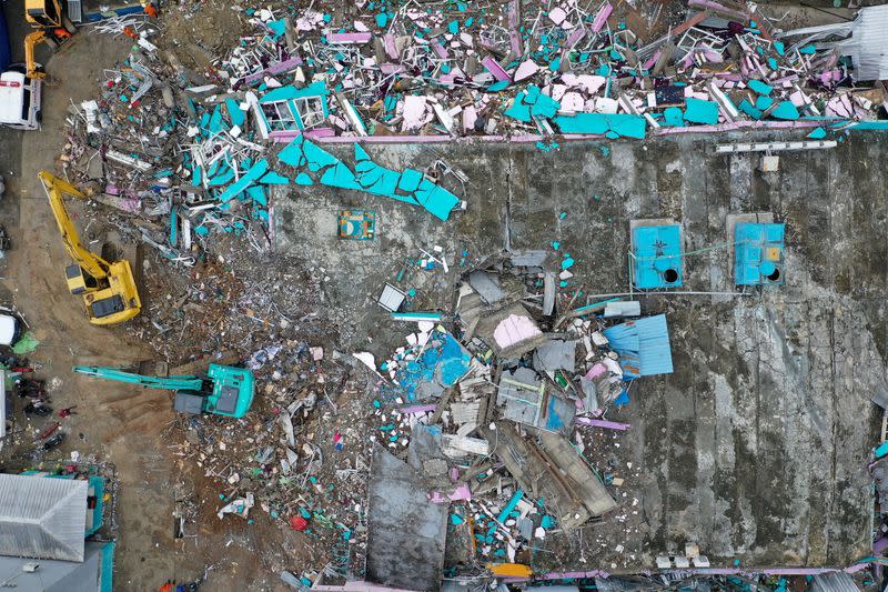 An aerial picture shows a hospital building collapsed following an earthquake in Mamuju