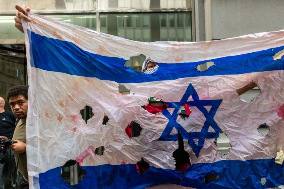 Pro-Palestinian protesters and a group of Israeli demonstrators hold dueling events outside of the New York Stock Exchange. Getty Images