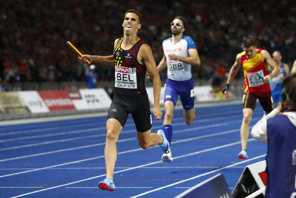 Belgium's Kevin Borlee crosses the line to win the gold medal in the men's 4x400-meter final at the European Athletics Championships at the Olympic stadium in Berlin, Germany, Saturday, Aug. 11, 2018. (AP Photo/Matthias Schrader)