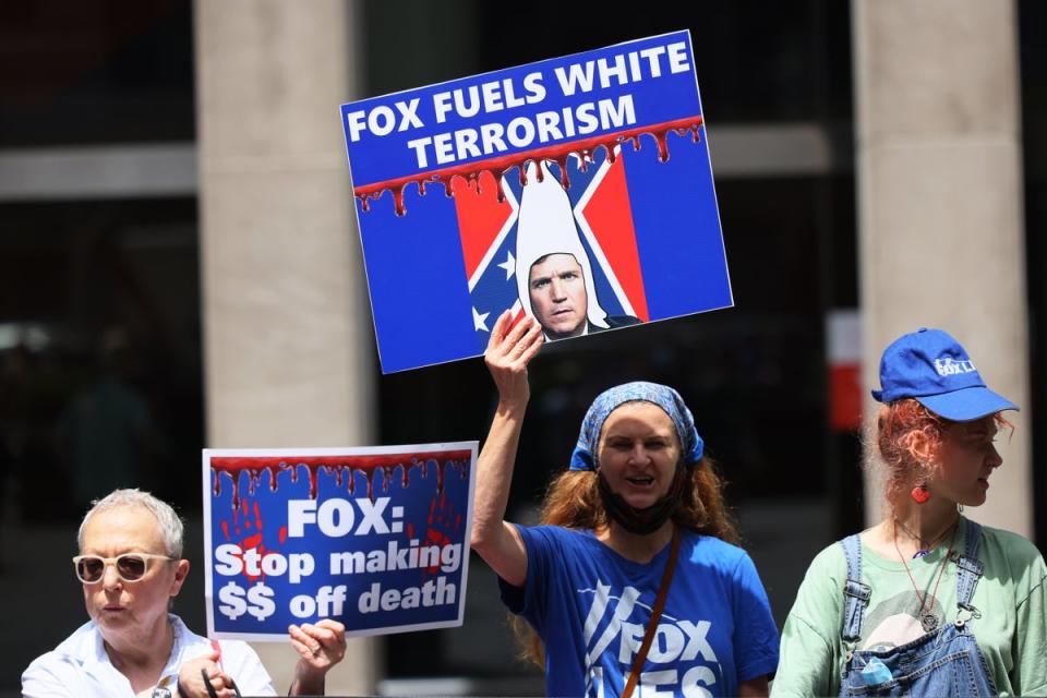 People gather for ‘Truth Tuesday’ as they participate in a ‘Fox can't handle the truth’ protest outside Fox News headquarters on June 14, 2022 in New York City (Getty Images)