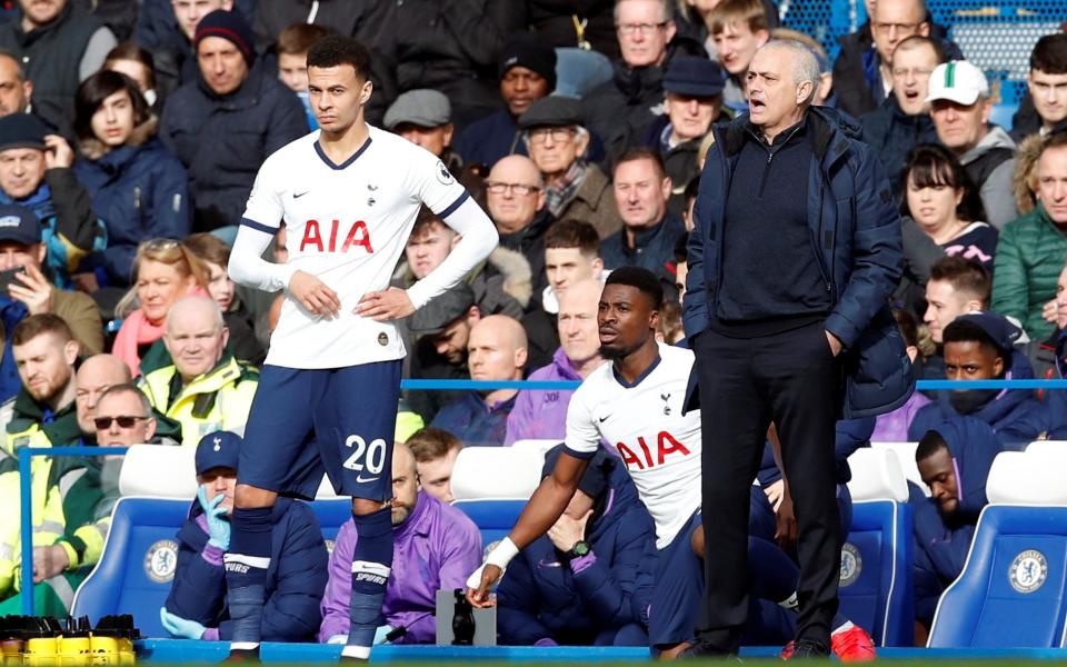 Tottenham Hotspur's Dele Alli waits to be substituted on alongside manager Jose Mourinho - REUTERS