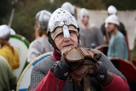 Re-enactors dress in historical costume as part of the Battle of Hastings anniversary commemoration events in Battle, Britain October 15, 2016. REUTERS/Neil Hall