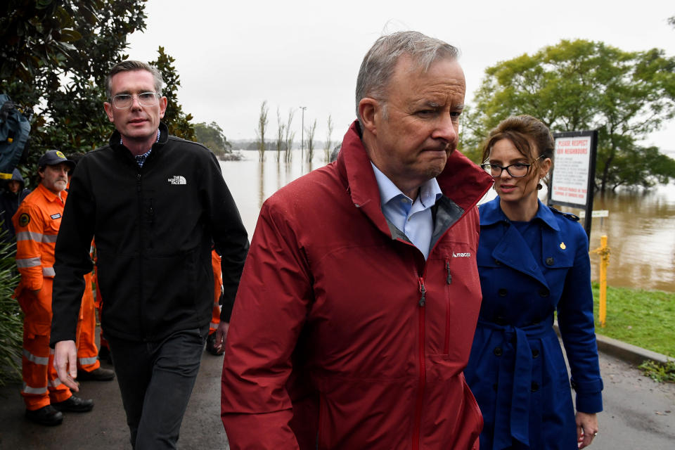 NSW Premier Dominic Perrottet, Prime Minister Anthony Albanese, and NSW Minister for Emergency Services and Resilience Steph Cook are seen after meeting with SES volunteers in Richmond, north-west of Sydney, Wednesday, July 6, 2022.